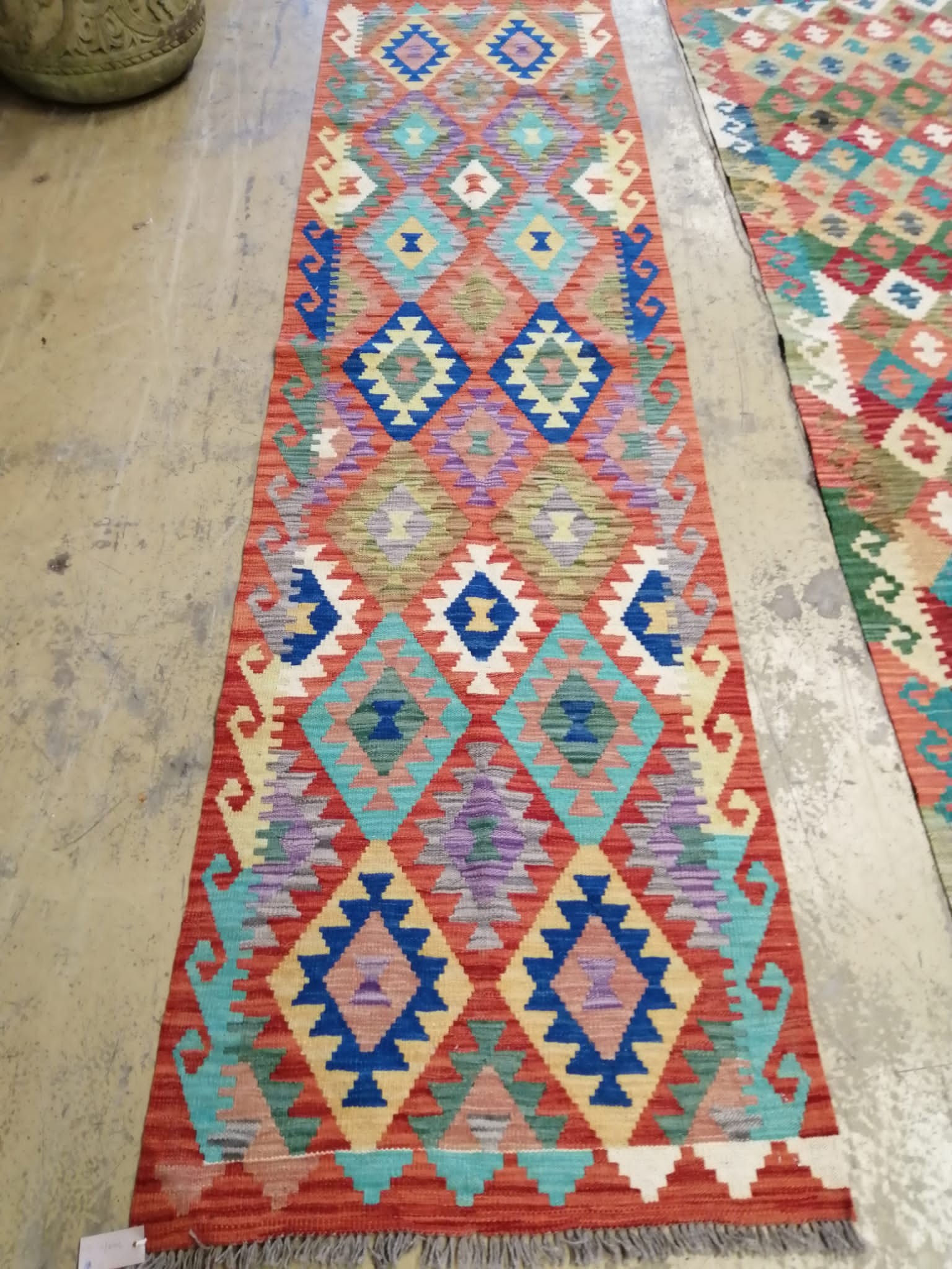 A Kilim multicoloured runner, 290cm x 80cm